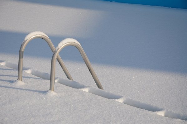 What is involved in winter pool maintenance?